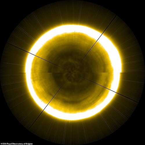 The sun's North Pole: The  line across the middle is created due to small changes in the solar atmosphere that occurred over the timeframe of creating this image. This image also shows a bright bulge on the upper-right side of the Sun; this is created by a low-latitude coronal hole rotating around the solar disc. The polar coronal hole region, which can be seen as the dark patch in the centre of the solar disc, is a source of fast solar wind. It is seen here to contain a subtle network of light and dark structures, which may cause variations in solar wind speed.