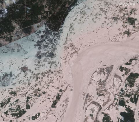 This satellite image shows the scale of the flooding along the banks of the Indus River in Rajanpur, Pakistan, on Sunday, August 28.