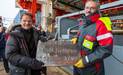 Chief scientist and the captain hold a steel plaque that was especially made for our visit to the North Pole.