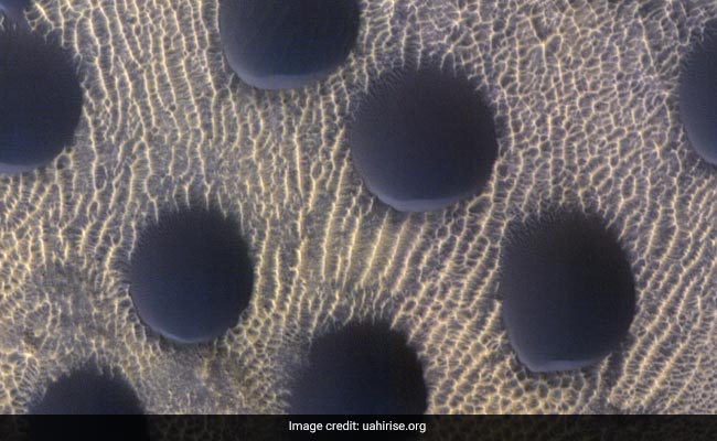 NASA Spacecraft Captures 'Unusual' Circular Sand Dunes On Mars
